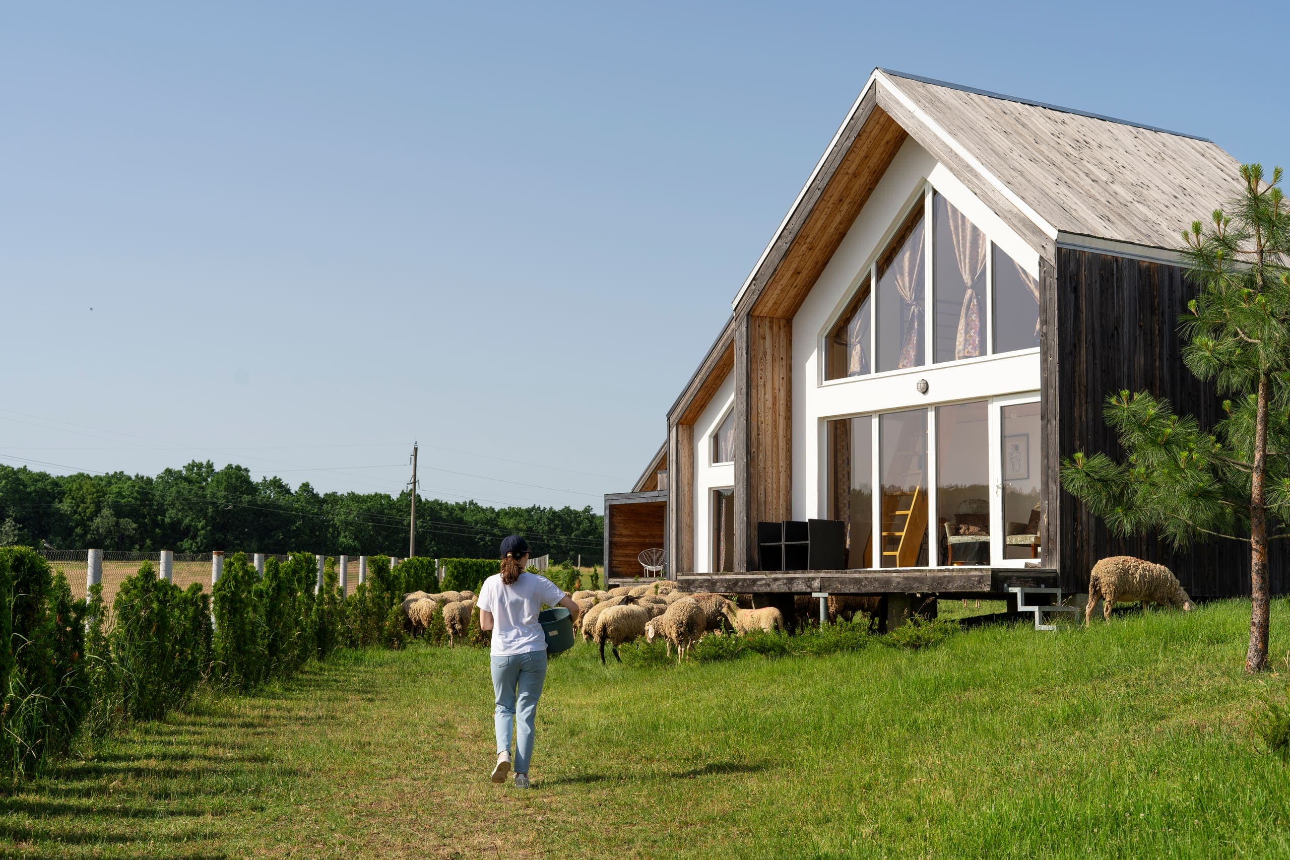 A timber home in open landscape — illustrative imagery
